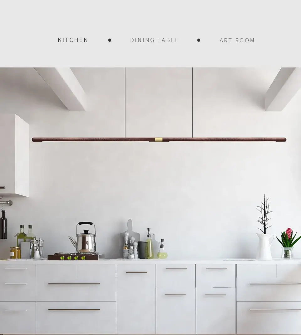 Modern kitchen featuring a luxury LED solid wood pendant light above a dining table.