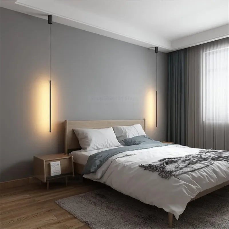 Nordic modern pendant lights in a minimalist bedroom, providing elegant illumination for home decor.
