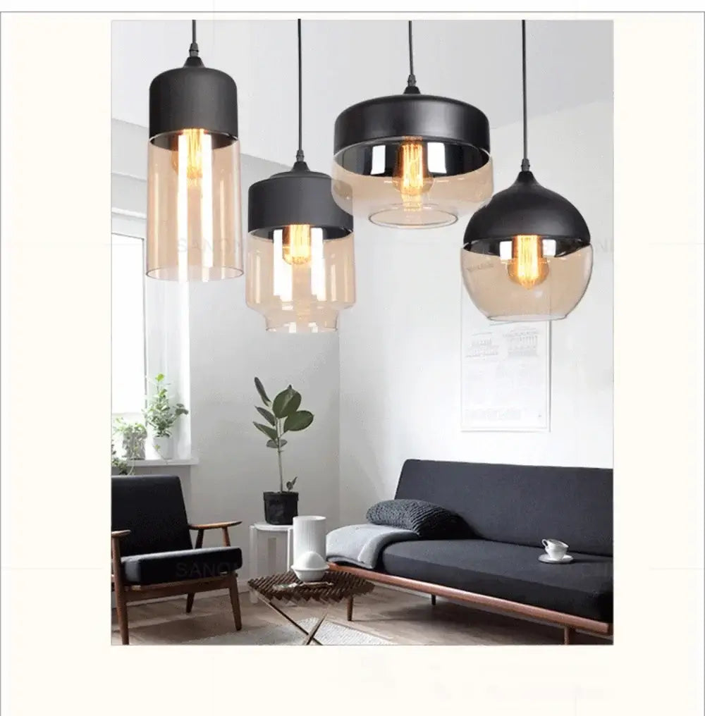 Nordic LED glass pendant lights with black fixtures in modern living room setting.