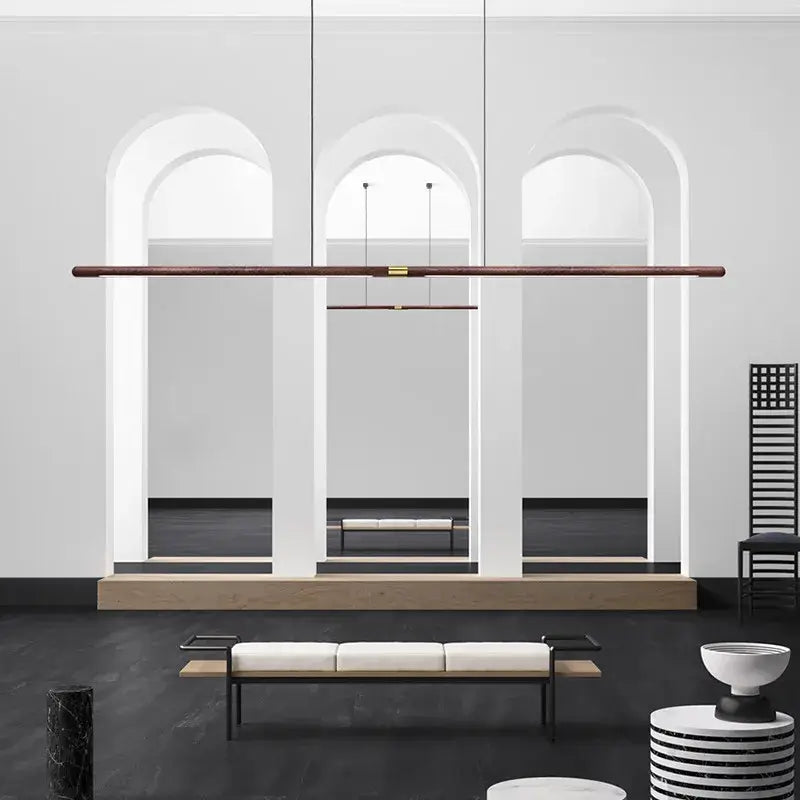 Luxury LED solid wood pendant light in a modern dining room with minimalist decor.