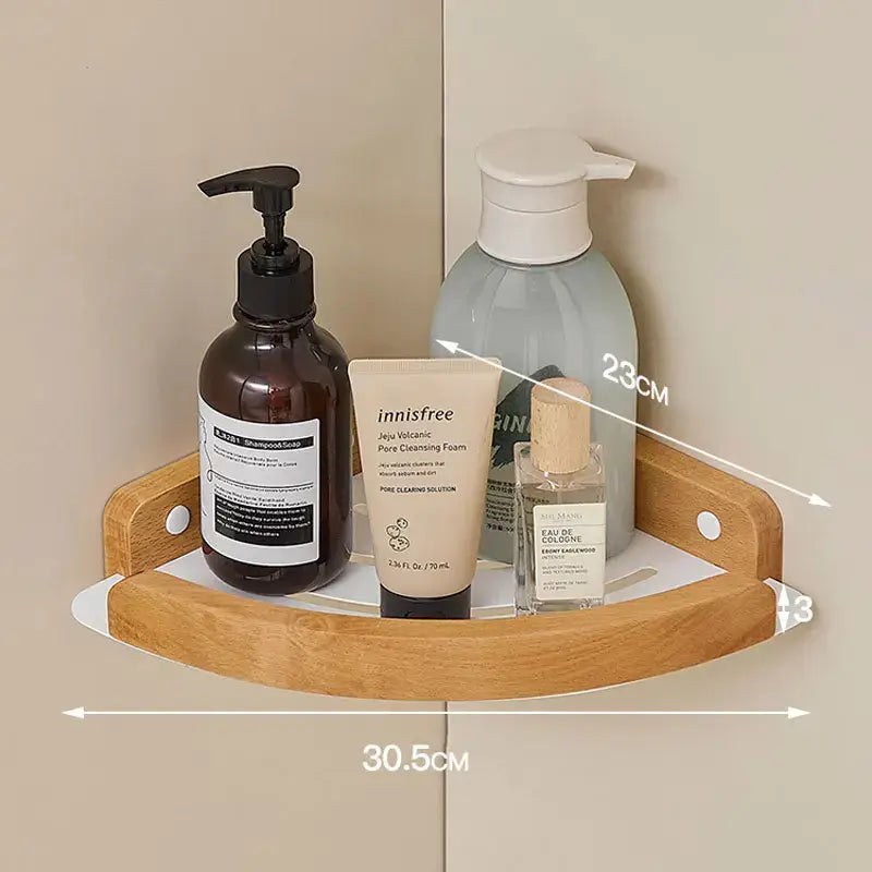 Black and white wall mounted bathroom shelves with bottles and soap, elegant storage solution for bathroom.