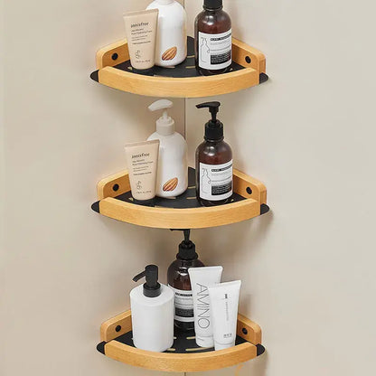 Black and white wall mounted bathroom shelves with skincare products arranged neatly.