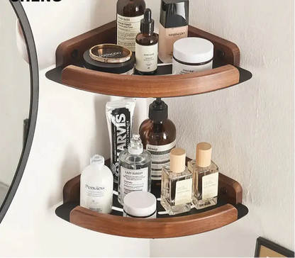 Black and white wall mounted bathroom shelves holding various beauty products and toiletries.