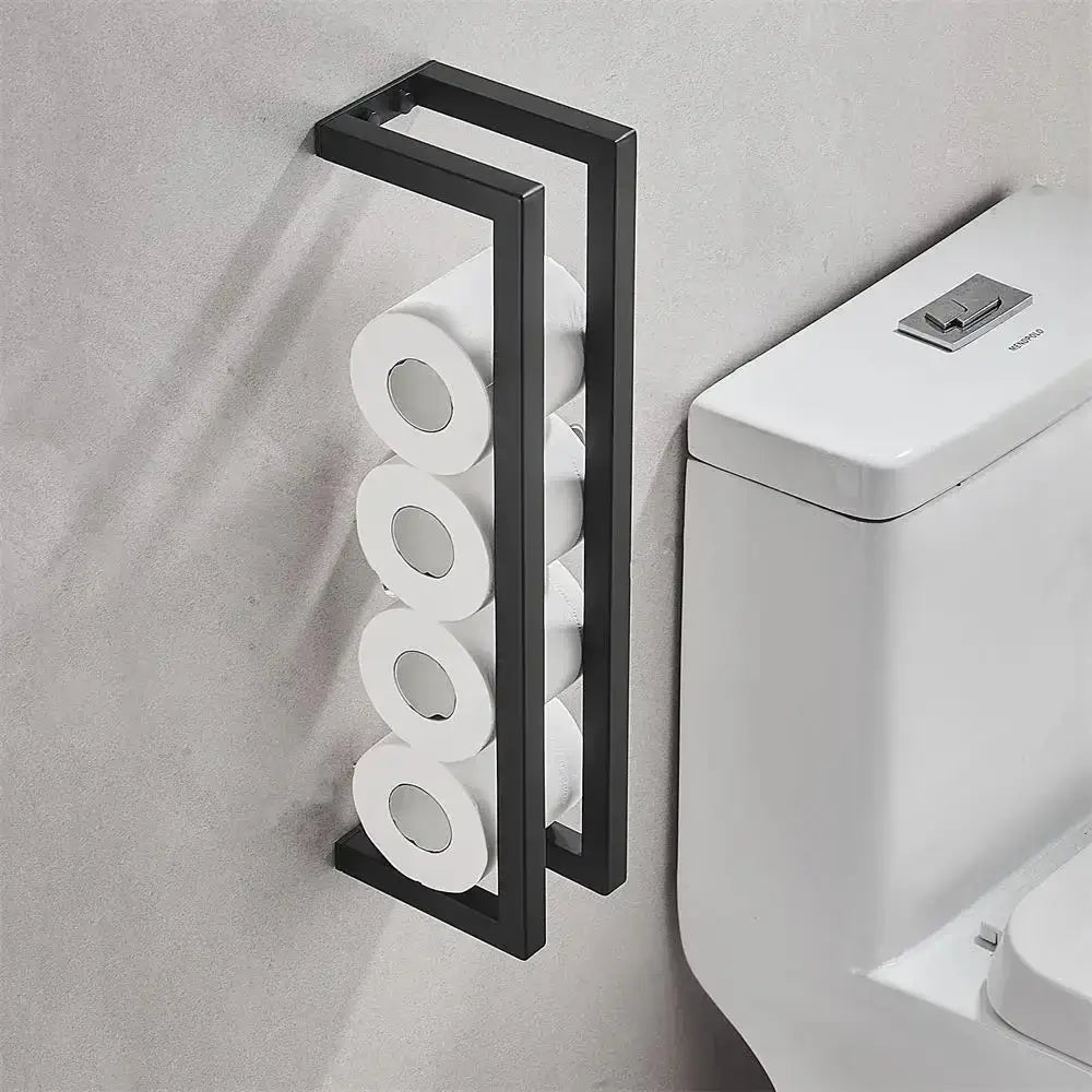 Black wall-mounted toilet paper holder storing multiple rolls next to a modern toilet in a stylish bathroom.