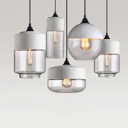 Modern Nordic LED glass pendant lights in various shapes hanging against a neutral background for stylish home decor.