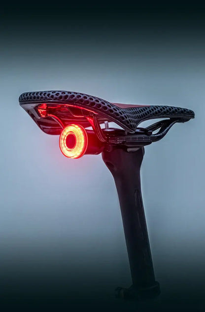 Smart Bike Tail Light – USB-C Rechargeable LED Rear Bicycle Light | IPX6 Waterproof Safety Light for Night Riding & Cycling on bike saddle.