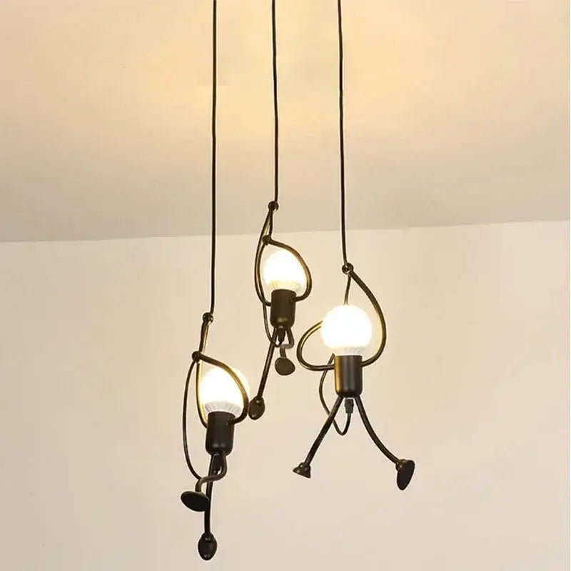 vintage industrial chandelier with unique modern art design featuring three hanging lights in black iron finish