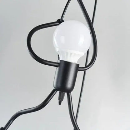 Close-up of a bulb in a vintage industrial chandelier showcasing unique modern art lighting design.