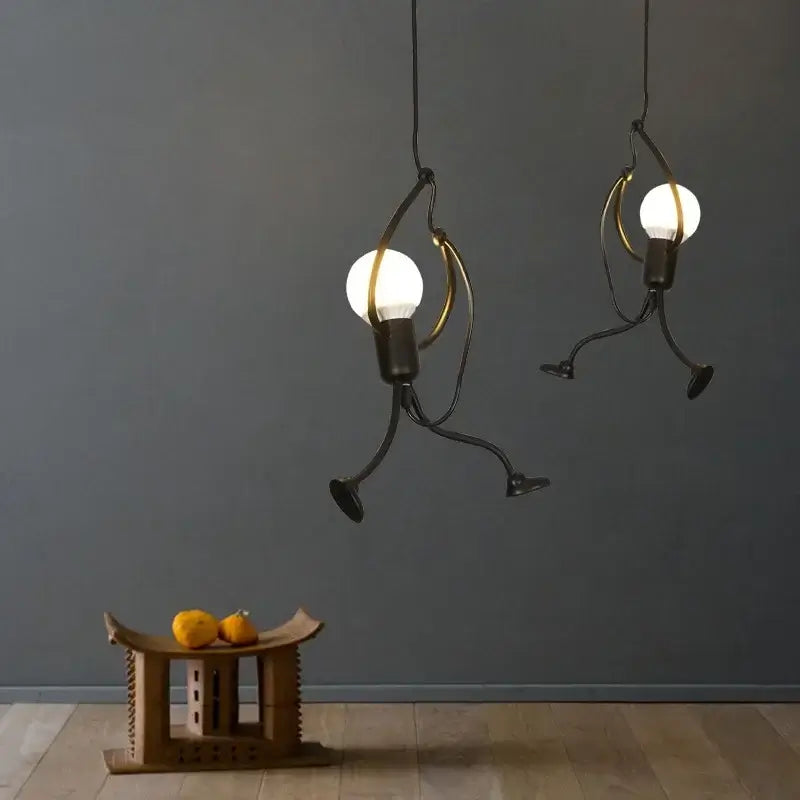 vintage industrial chandelier with unique artistic design and black iron finish illuminating a modern interior.