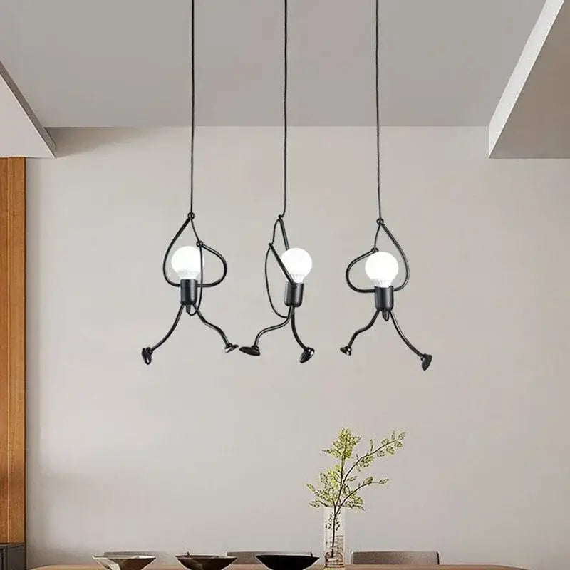 vintage industrial chandelier hanging from a modern ceiling in a stylish interior setting with plants.